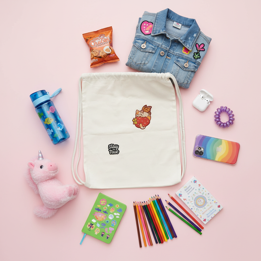 Drawstring Backpack with Kids Essentials Flat Lay